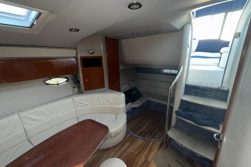  Yacht Photos Pics Interior of 2006 Formula 40 Performance Cruiser with seating and stairs.