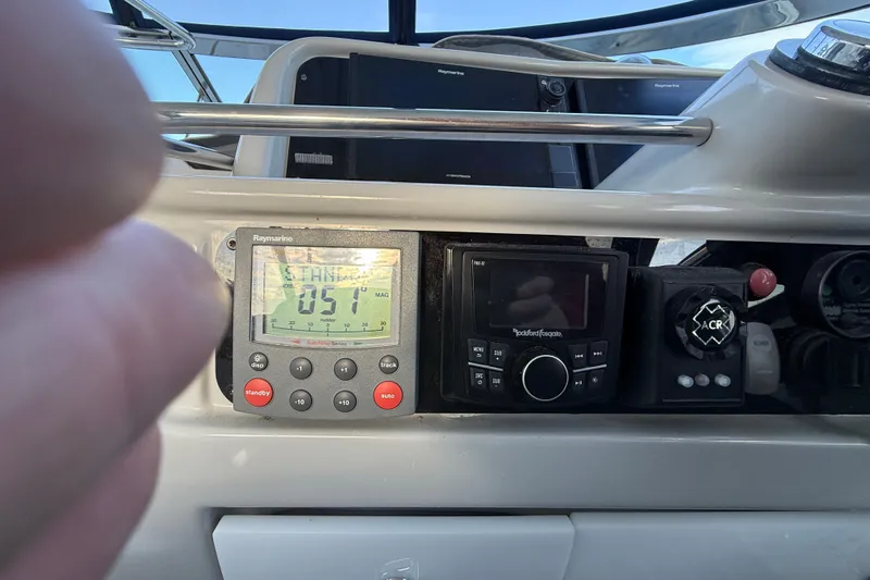  Yacht Photos Pics Control panel of a 2006 Formula 40 Performance Cruiser with navigation and audio systems.