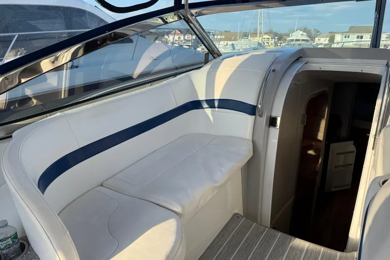  Yacht Photos Pics 2006 Formula 40 Performance Cruiser interior with white seating and cabin entrance.