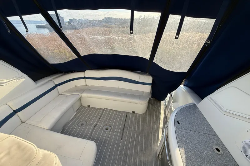  Yacht Photos Pics Interior of 2006 Formula 40 Performance Cruiser with seating and covered windows.