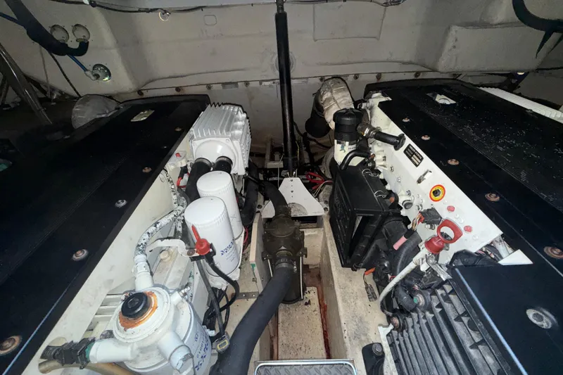  Yacht Photos Pics Engine room of a 2006 Formula 40 Performance Cruiser, showcasing dual engines and components.