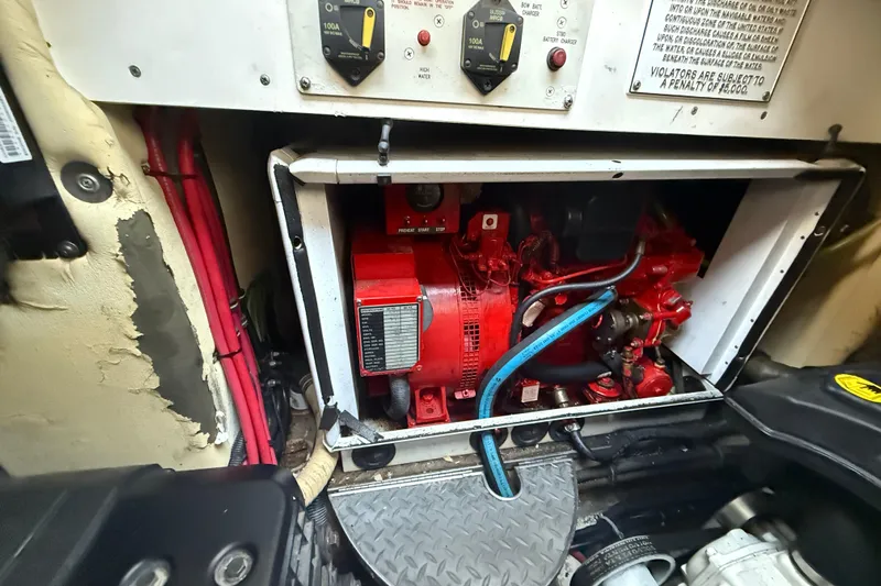  Yacht Photos Pics Engine compartment of a 2006 Formula 40 Performance Cruiser with visible wiring and components.