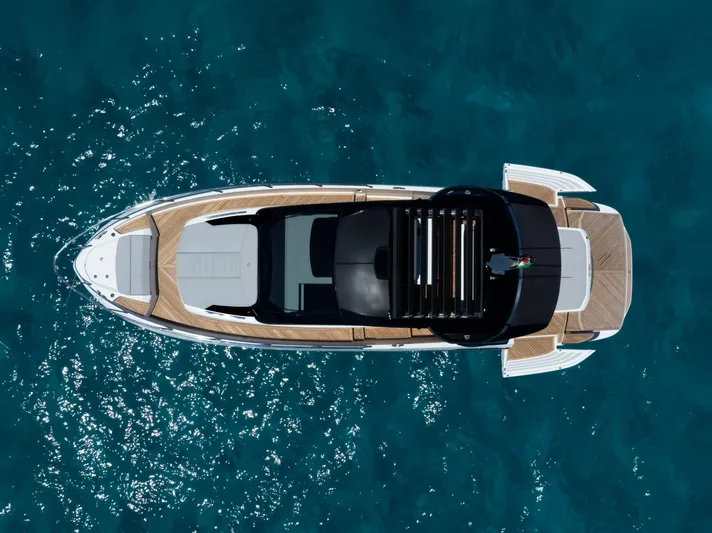  Yacht Photos Pics Top view of 2024 FIM 440 Regina yacht on clear blue water.