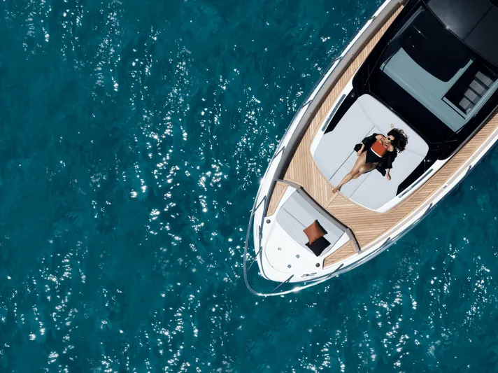  Yacht Photos Pics Aerial view of 2024 FIM 440 Regina yacht on clear blue water.