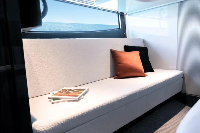  Yacht Photos Pics Luxurious interior of 2024 FIM 440 Regina yacht with cozy seating and ocean view.