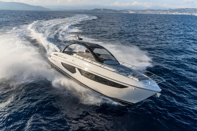  Yacht Photos Pics 2024 FIM 440 Regina luxury yacht cruising on open sea.