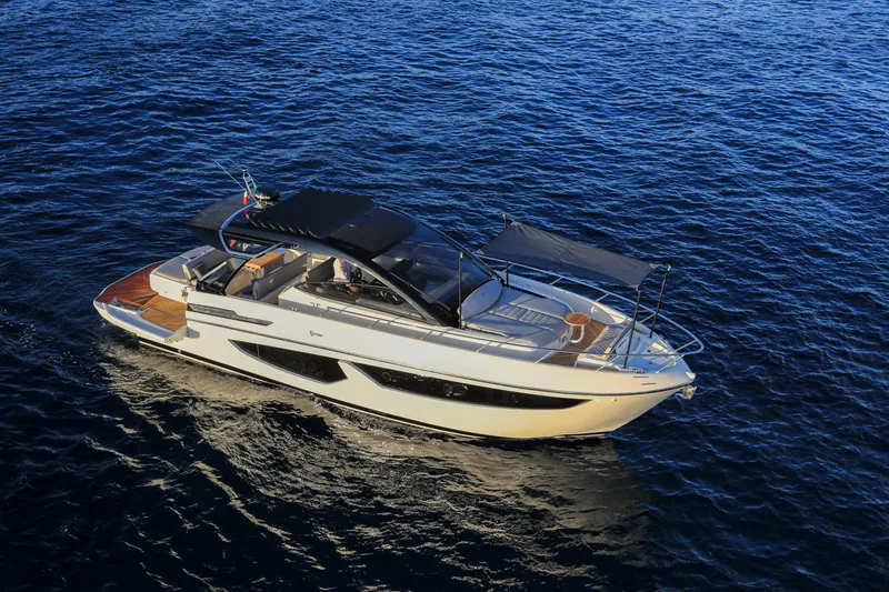  Yacht Photos Pics 2024 FIM 440 Regina luxury yacht cruising on open water.