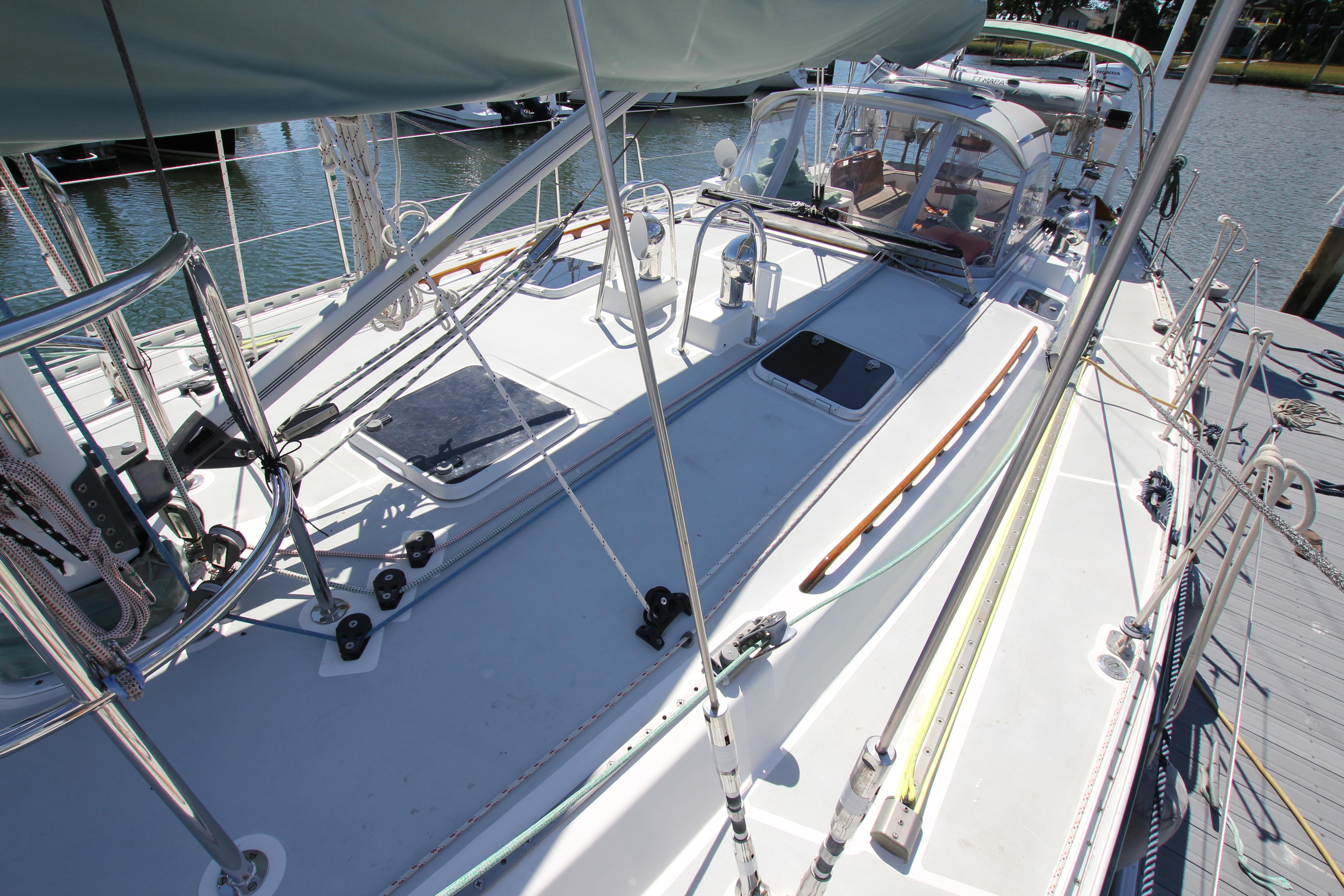 Sailboat deck of 1998 Able Apogee 50, featuring rigging and cockpit area.
