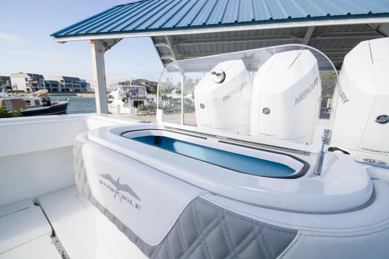  Yacht Photos Pics 2026 Invincible 39 Open Fisherman boat with Mercury engines docked at marina.