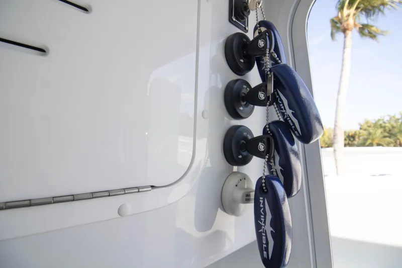  Yacht Photos Pics Key fobs hanging inside a 2026 Invincible 39 Open Fisherman boat.