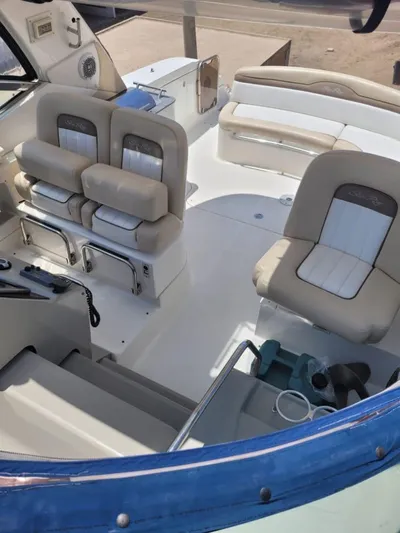 Knot On Call Yacht Photos Pics 2013 Sea Ray Sundancer 370 cockpit with beige seating and helm station.