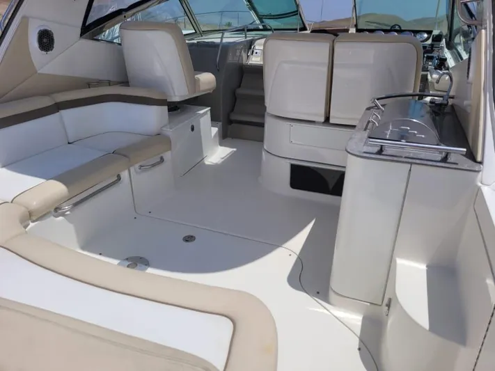 Knot On Call Yacht Photos Pics Interior of 2013 Sea Ray Sundancer 370 yacht with seating and helm.