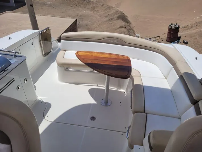 Knot On Call Yacht Photos Pics 2013 Sea Ray Sundancer 370 boat interior with beige seating and wooden table.