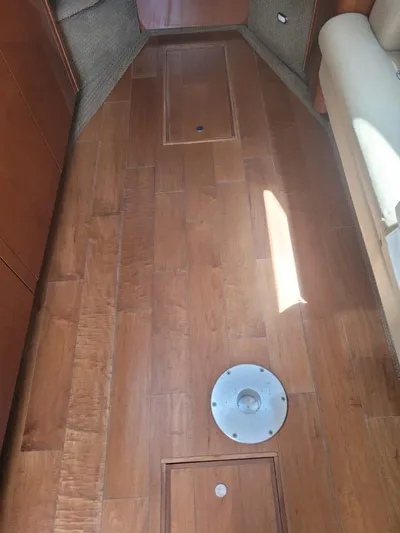 Knot On Call Yacht Photos Pics Interior view of 2013 Sea Ray Sundancer 370 with wooden flooring.