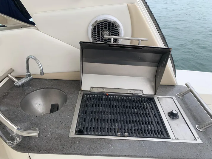 Knot On Call Yacht Photos Pics Outdoor kitchen on 2013 Sea Ray Sundancer 370 yacht with grill and sink.