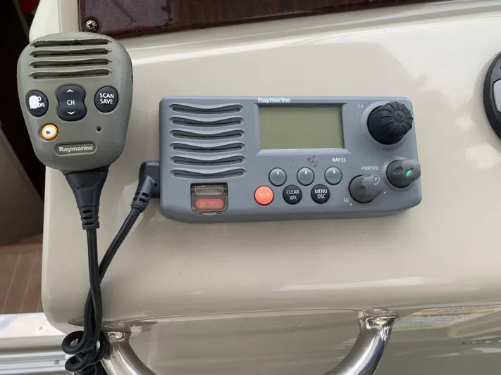 Knot On Call Yacht Photos Pics Raymarine marine radio system on 2013 Sea Ray Sundancer 370 yacht dashboard.
