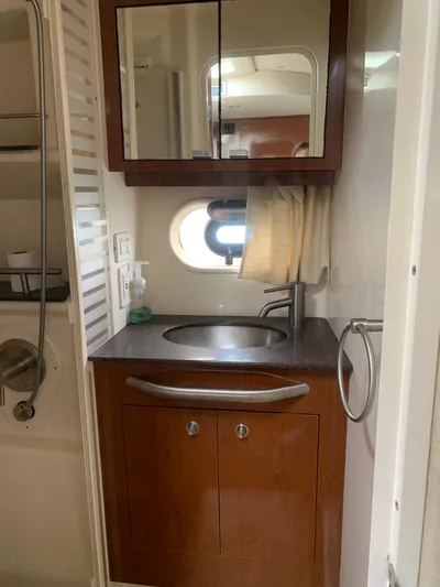 Knot On Call Yacht Photos Pics Bathroom vanity in 2013 Sea Ray Sundancer 370 yacht with mirror and sink.