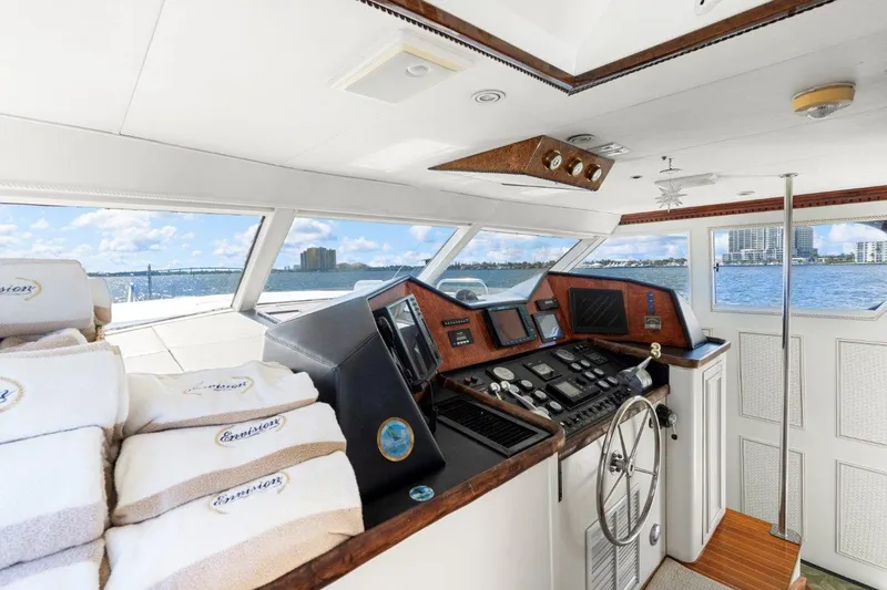Envision Yacht Photos Pics Interior helm of 1984 Broward 110 Motor Yacht with ocean view.
