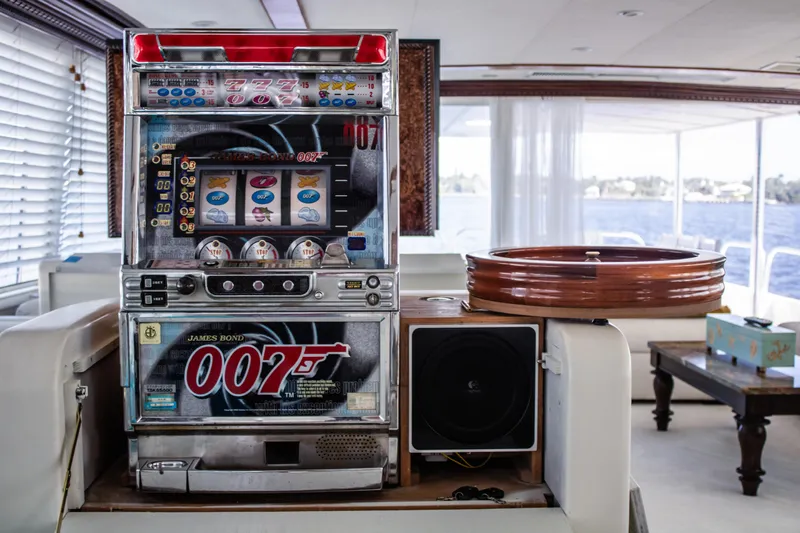 Envision Yacht Photos Pics Slot machine on 1984 Broward 110 Motor Yacht interior.