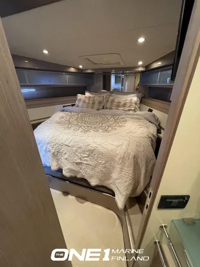  Yacht Photos Pics Luxurious cabin interior of a 2007 Riva Rivale 52 yacht with elegant bedding.