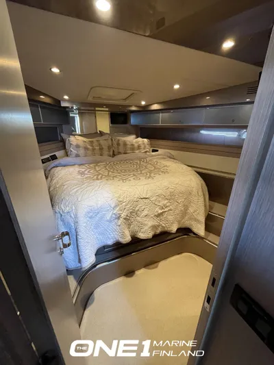  Yacht Photos Pics Luxurious bedroom interior of 2007 Riva Rivale 52 yacht with elegant bedding.