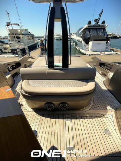  Yacht Photos Pics 2007 Riva Rivale 52 yacht with luxurious deck, docked at marina.