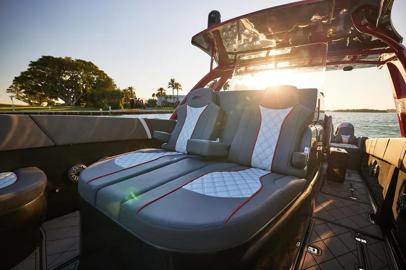  Yacht Photos Pics Luxurious seating on a 2020 Midnight Express 37 Open boat at sunset.
