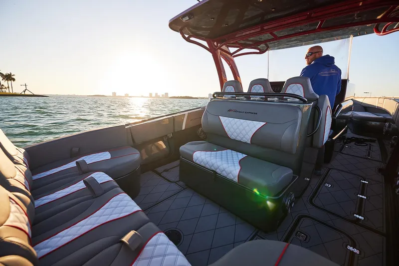  Yacht Photos Pics 2020 Midnight Express 37 Open boat interior with luxurious seating at sunset on the water.