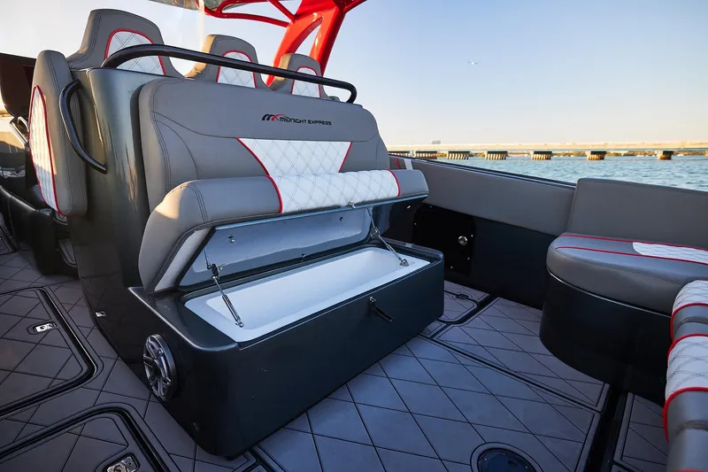  Yacht Photos Pics Luxury seating on 2020 Midnight Express 37 Open boat with storage compartment open.