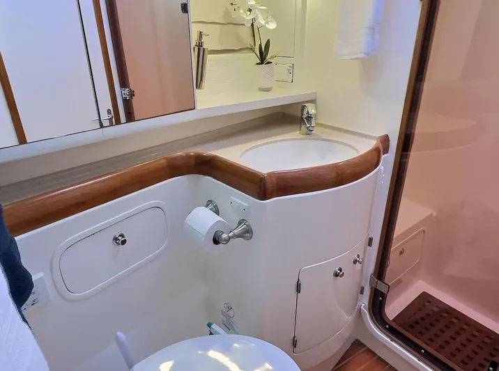 Celebrate Yacht Photos Pics Luxurious bathroom in 2003 Taswell 58 yacht with modern fixtures and elegant design.
