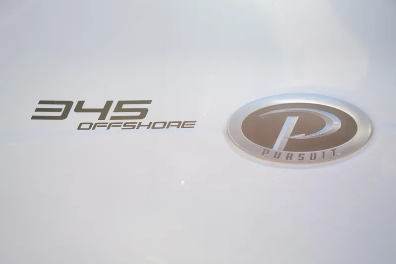  Yacht Photos Pics 2015 Pursuit OS 345 Offshore logo and emblem on white background.
