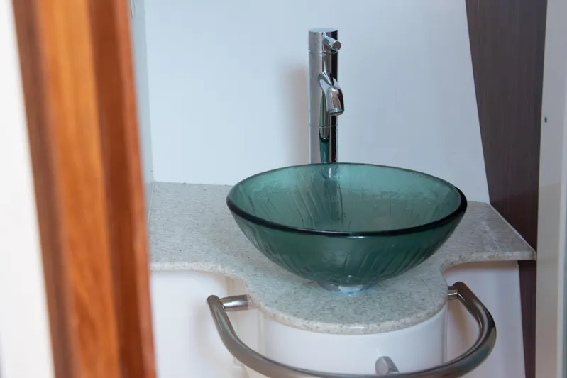  Yacht Photos Pics Glass sink in 2015 Pursuit OS 345 Offshore boat bathroom.