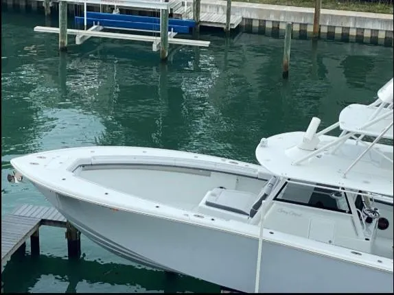 One More Day Yacht Photos Pics 2019 Yellowfin Center Console boat docked in marina.