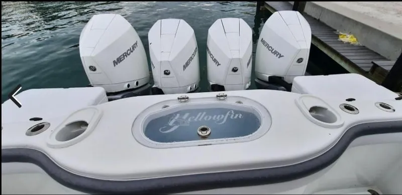 One More Day Yacht Photos Pics 2019 Yellowfin Center Console boat with four Mercury engines at dock.