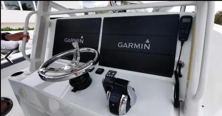 One More Day Yacht Photos Pics 2019 Yellowfin Center Console boat dashboard with Garmin navigation system.