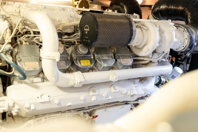 Pecado Yacht Photos Pics Engine of a 2006 Bertram 510 Convertible yacht, showcasing detailed components and design.