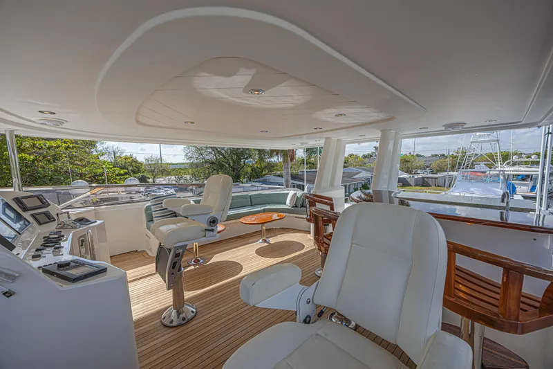 Cerca Trova Yacht Photos Pics Luxurious 2011 Westport 112 yacht interior with modern seating and navigation controls.