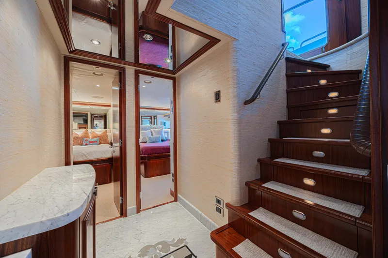 Cerca Trova Yacht Photos Pics Luxurious interior of 2011 Westport 112 yacht with elegant staircase and bedrooms.