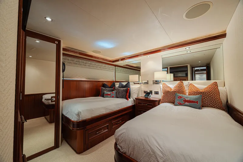 Cerca Trova Yacht Photos Pics Luxurious 2011 Westport 112 yacht bedroom with elegant wood finishes and plush bedding.
