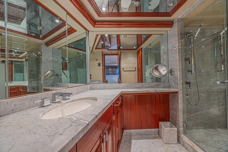 Cerca Trova Yacht Photos Pics Luxurious yacht bathroom with marble countertops and wood accents, Westport 112, 2011 model.
