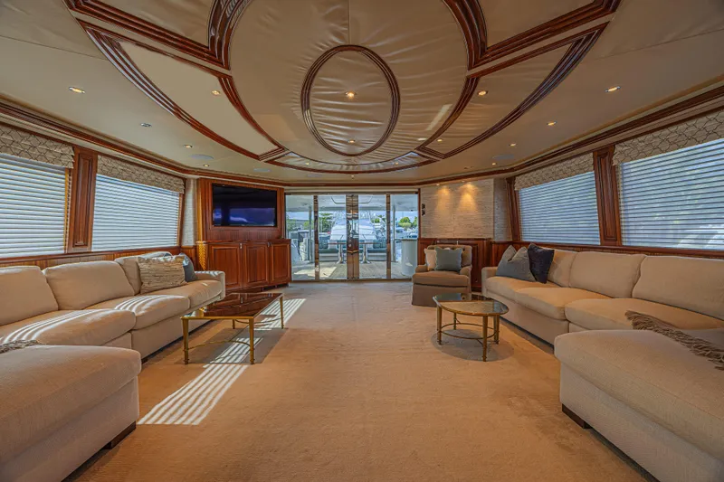 Cerca Trova Yacht Photos Pics Luxurious interior of 2011 Westport 112 yacht with elegant seating and modern decor.