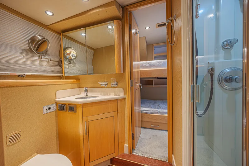 Cerca Trova Yacht Photos Pics Luxurious bathroom interior of 2011 Westport 112 yacht with modern fixtures and shower.