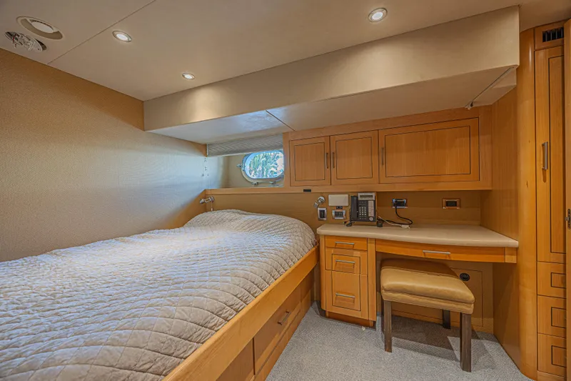Cerca Trova Yacht Photos Pics Luxurious cabin interior of 2011 Westport 112 yacht with bed and desk.