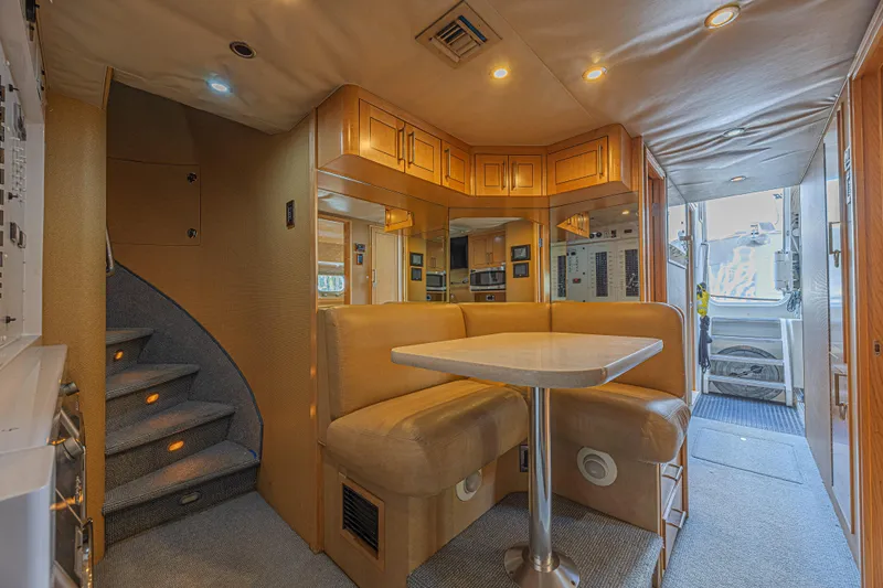 Cerca Trova Yacht Photos Pics Luxurious interior of 2011 Westport 112 yacht with cozy seating and modern amenities.