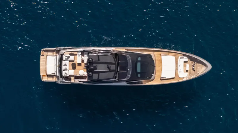 Stile Di Vita Yacht Photos Pics Aerial view of 2023 Riva 102 Super Cosaro yacht on deep blue water.