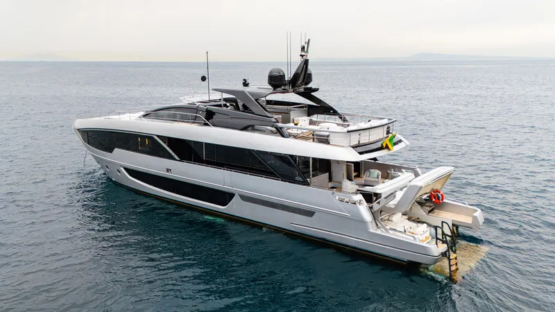 Stile Di Vita Yacht Photos Pics 2023 Riva 102 Super Cosaro yacht on open water, showcasing sleek design and luxury features.