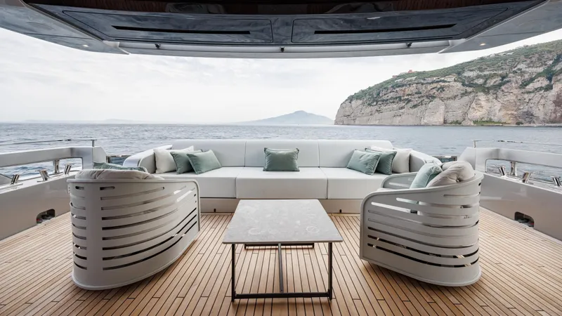 Stile Di Vita Yacht Photos Pics Luxurious deck of 2023 Riva 102 Super Cosaro yacht with ocean view and elegant seating.