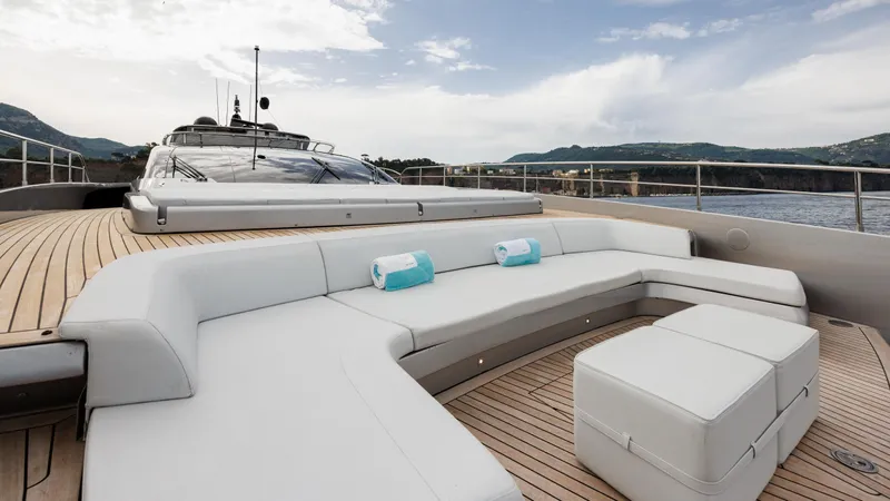 Stile Di Vita Yacht Photos Pics Luxurious 2023 Riva 102 Super Cosaro yacht with spacious deck and elegant seating.