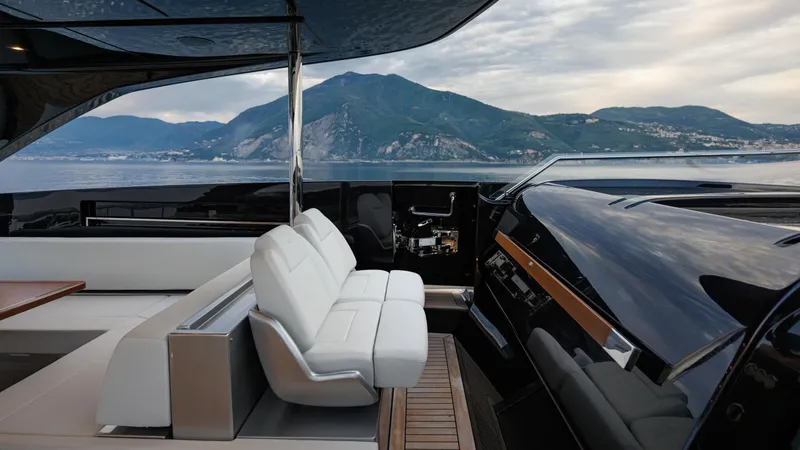 Stile Di Vita Yacht Photos Pics Luxurious 2023 Riva 102 Super Cosaro yacht interior with scenic mountain view.