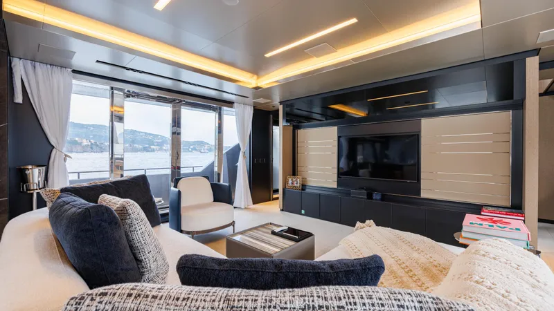 Stile Di Vita Yacht Photos Pics Luxurious interior of 2023 Riva 102 Super Cosaro yacht with modern decor and large windows.